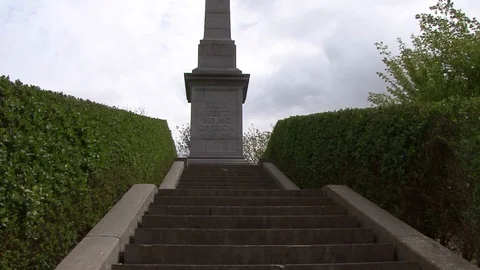 LS low angle stairs XL IX West Riding Division Monument at Essex Farm Cemetery Stock Footage 97792672