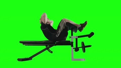 LS Man Doing Stomach Crunches on Exercise Bench with Green Background 4K Stock Footage 57985978