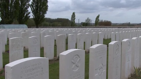 LS rows of Commonwealth Gravestones at Tyne Cot Cemetery in Ypres, Belgium Stock-Footage 98401933