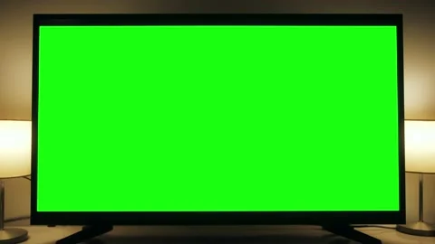 LSD smart TV screen with a blank green background in the living room. Chroma key Stock Footage 196121228