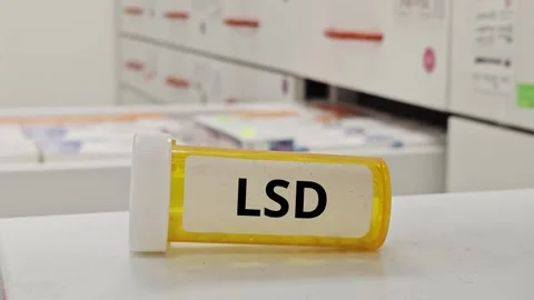 LSD tablets representing psychedelic compound affecting perception and cogn.. Stock Footage 338258654