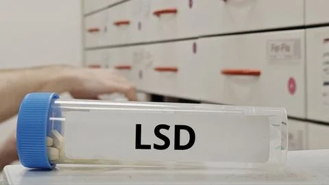 LSD tablets representing psychedelic compound affecting perception and cogn.. Stock Photos