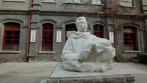 Lu Xun statue on the campus of Lu Xun Middle School，china,beijing Stock Footage 143290335