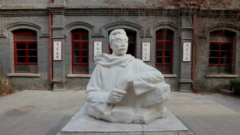 Lu Xun statue on the campus of Lu Xun Middle School，china,beijing Stock Footage 143290545