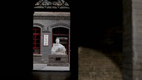 Lu Xun statue on the campus of Lu Xun Middle School，china,beijing Stock Footage 143291342