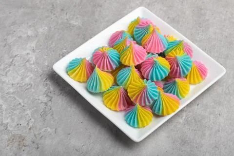 A-lua or Allure Thai handmade candy in a mini bowl on gray desktop. A-lua T.. Foto stock