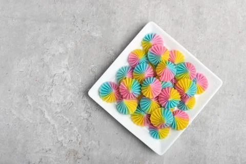 A-lua or Allure Thai handmade candy in a mini bowl on gray desktop. A-lua T.. Foto stock