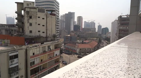 Luanda, Angola - June 2016; Old and new buildings and traffic on busy streets Stock Footage 65111679