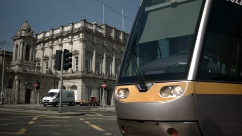 Luas passes Heuston train station, Dublin Stock Footage 99739620