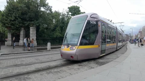 Luas tram. Dublin's light rail system operating through urban streets in Stock-Footage 311762922
