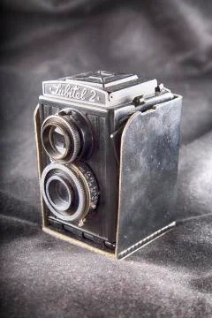 Lubitel 2 camera over black background Ilustração Stock