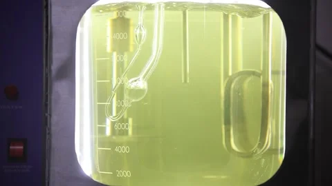 Lubricant oil bubbling at viscosity bath, showing accept parameters for the Stock Footage 301754945