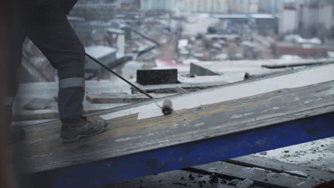 Lubricating concrete formwork before pouring on construction site Stock Footage 327613302