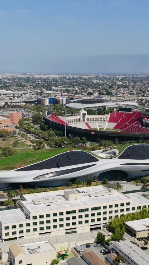 Lucas Museum of Narrative Art showcasing futuristic architecture next to BMO Sta Stock Footage 337417513