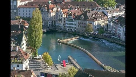 Lucerne cityscape with river and historic buildings on a sunny day Stock Footage 328521196