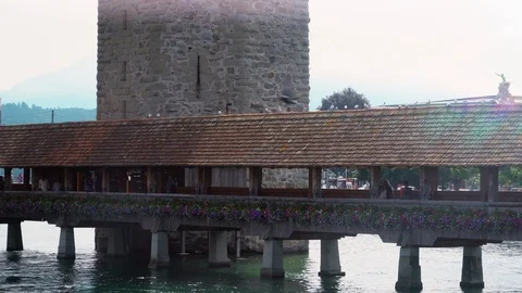 Lucerne / Switzerland: Partial view of the Chapel Bridge over river Reuss Stock Footage 117687598