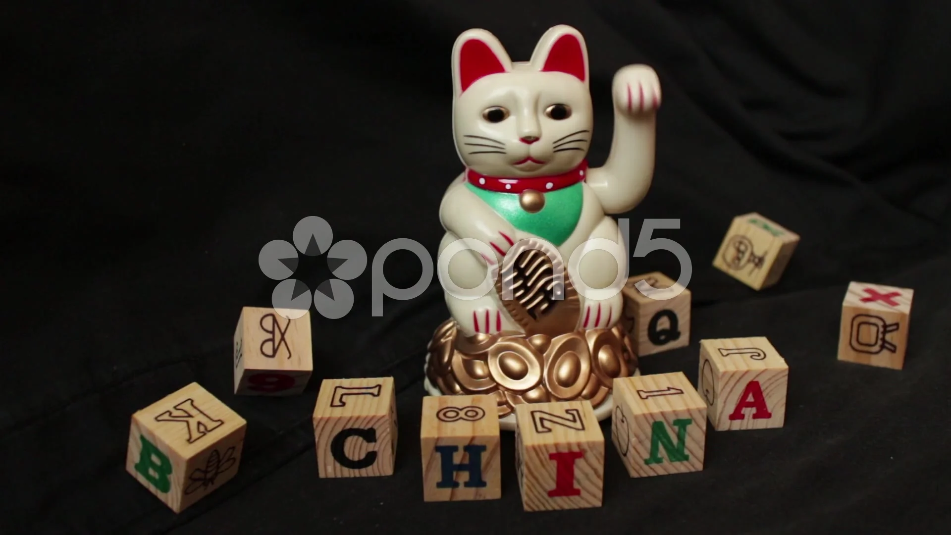 Lucky Asian Cat Waving With Toy Blocks Static Spelling Lucky Asian Cat Waving With Toy Blocks Static Spelling China Footage 44887218