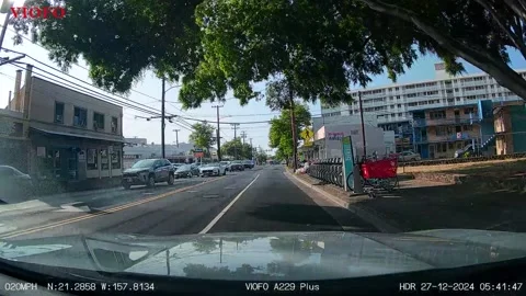 Lucky Pedestrian Crosses Road Without Looking, Honolulu, Hawaii, USA - 26 Dec 20 Stock Footage 296847873