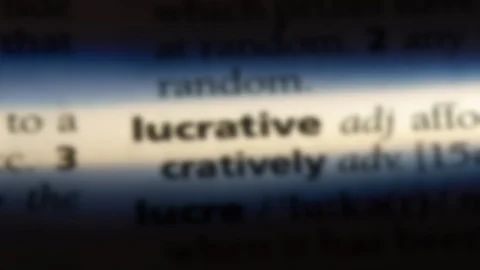 Lucrative word in a dictionary. Stock Footage 99563075