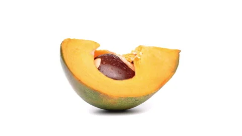 Lucuma fruit slice rotating on white background. Stock Footage 158554170