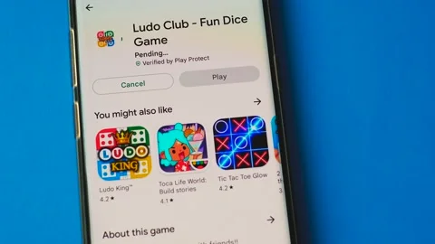Ludo Club program is installed on a mobile device, close-up. Ludo Club applicati Stock Footage 207401925