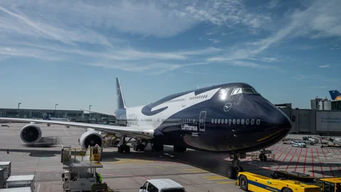 A Lufthansa Boeing 747-800 aircraft during a turnaround in Frankfurt Stock Footage 337689972