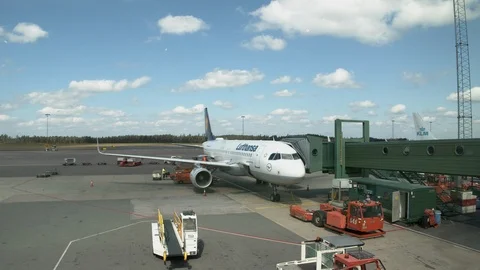 A Lufthansa jet being loaded at the gate at Landvetter airport. 스톡 동영상 119737755