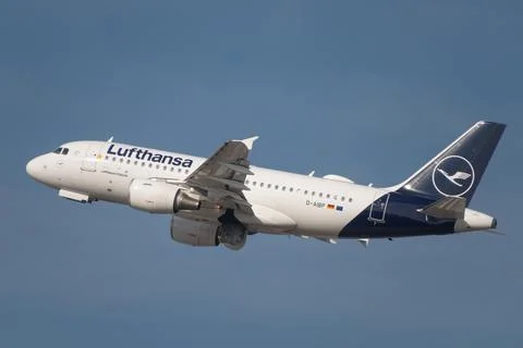Lufthansa plane flies in the blue sky. March 21,2025. Warsaw, Poland. Stock Photos