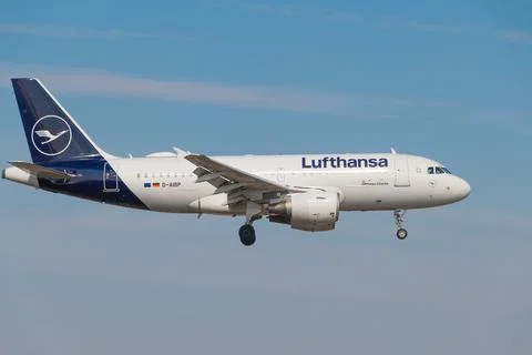 Lufthansa plane flies in the blue sky. March 21,2025. Warsaw, Poland. Stock Photos