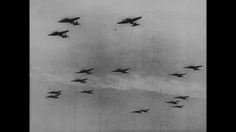 Luftwaffe German bomber fly over British coast - 1940-1943 Stock Footage