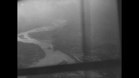 Luftwaffe planes fly over burning buildings Stock Footage 103389743