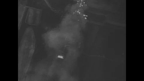 Luftwaffe planes fly over burning buildings Stock Footage 103389770