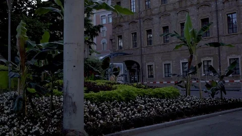 Lugano green park in down town with trees, palms and flowers, sunset Stockbeeldmateriaal 123746274