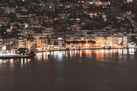 Lugano, Switzerland. Snow covered city at night. Stock Photos