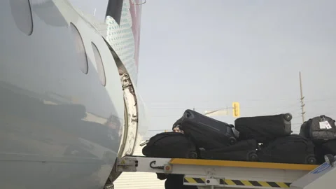 Luggage Being Loaded on to a Plane Stock-Footage 148691641