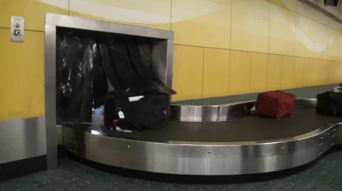 Luggage on carousel Stock Footage 1240702