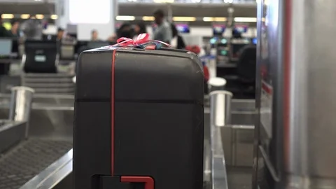 Luggage check in tagging attach before loading Stock Footage 104290830