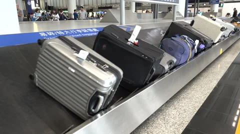 Luggage on the conveyor belt at Stock Video Pond5