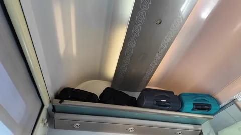Luggage storage compartment inside first class train in Morocco railway, Stock Footage 278402013