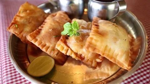 Lukhmi is a baked indian snack Stock Footage 74366434