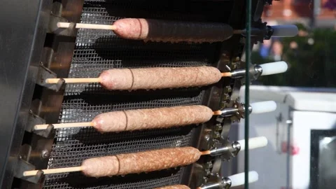 Lula kebabs in cooking machine Stock Footage 209642994