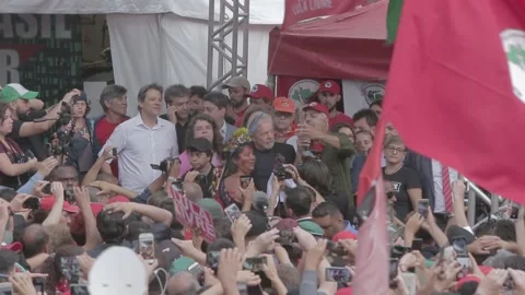 Lula on stage after being released from jail hugs an indigenous woman 스톡 동영상 220044425