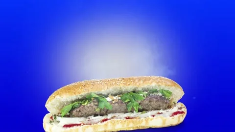 Lule kebab in bread on blue background position from bottom to center Stock Footage 135072826