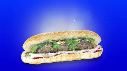 Lule kebab in bread on blue background position from left to center Stock Footage 135078104