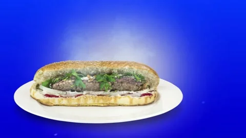 Lule kebab in bread on blue background direction from left to center Stock Footage 135125565