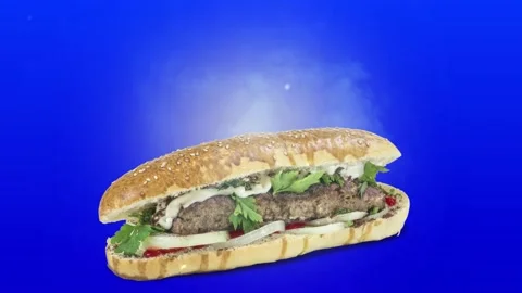 Lule kebab in bread on blue background Stock Footage 135176702