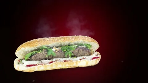 Lule kebab in bread on dark background position from left to center Stock Footage 135072832