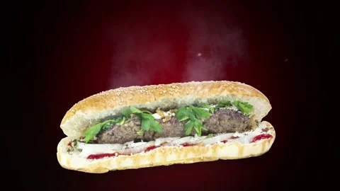 Lule kebab in bread on dark background position from bottom to center Stock Footage 135072886