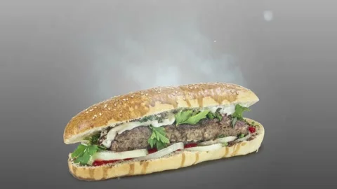 Lule kebab in bread on gray background Stock Footage 135176903