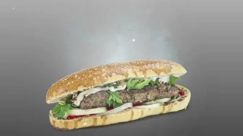 Lule kebab in bread on gray background Stock Footage 135176914